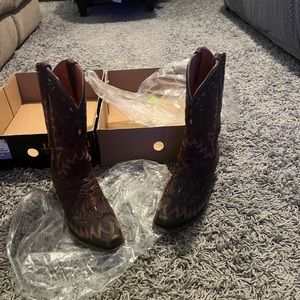 Probably worn 2 maybe three time Men Dan Post size 10.5 paid over 600$ for these